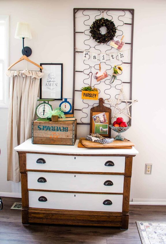 s 15 clever ways you never thought to use your old furniture, Hang decor on metal mattress springs