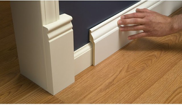 install wide baseboard molding over existing narrow