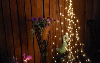Upcycle an Old Watering Can Into a Solar Light Display
