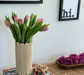 s 16 genius decor hacks that ll save you money, Decorate a vase with dowels