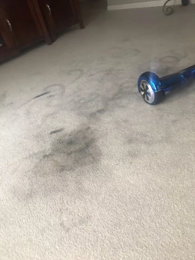 q halp me how do i get this hoverboard stain of carpet i cant get it off
