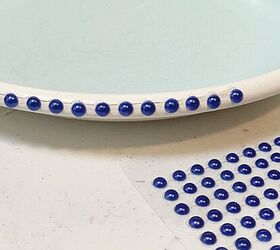 Use Dollar Tree stickers to turn a boring plate into the cutest accent in your kitchen
