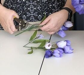 She uses 14 bunches of faux tulips for this crazy beautiful door idea