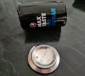 Nevermind expensive wall decor—use a few empty soda cans to do this instead