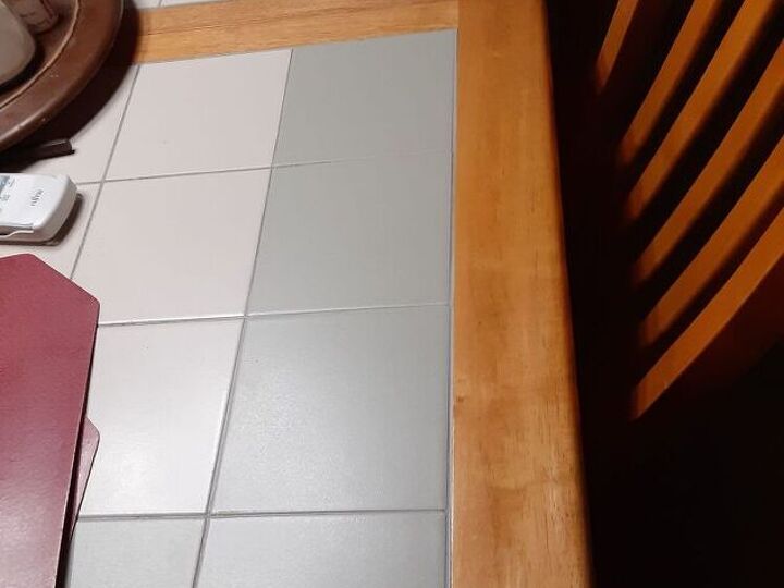 q how would you refinish a dining room table with surface time inlaid