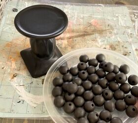 Glue wood beads to a candlestick for this magazine-worthy accent