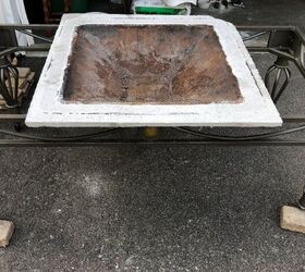 She puts a fire tray inside an old coffee table for this unique outdoor update