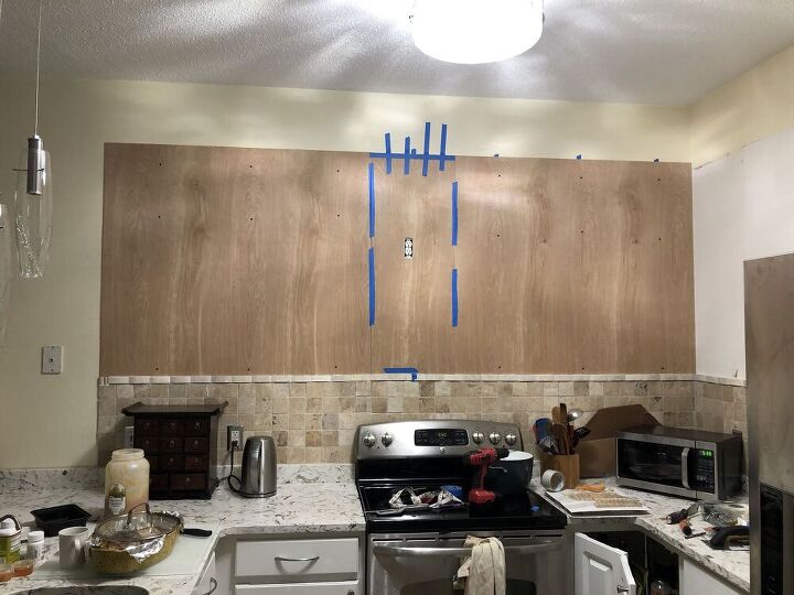 no to kitchen cabinets, Plywood installed on the wall
