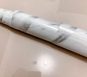 The $2 way to protect your tabletop using small scraps of wallpaper