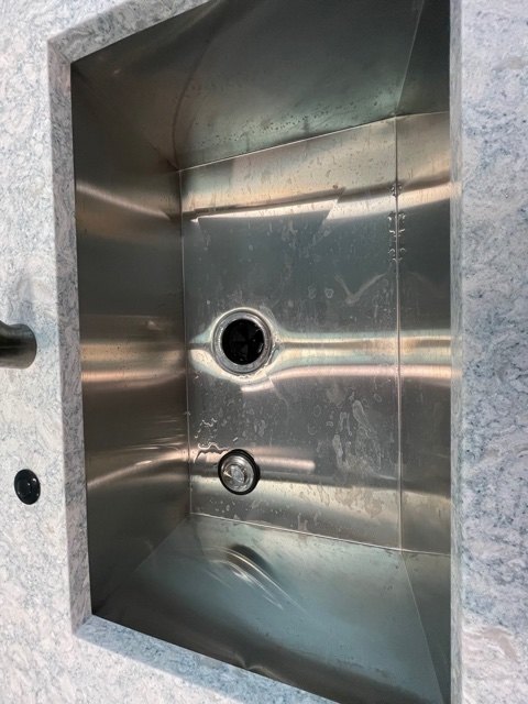 how do i keep water spots off stainless steel sink