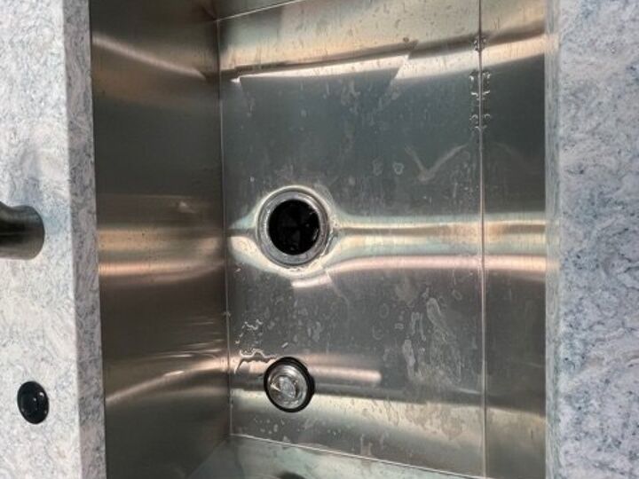 q how do i keep water spots off stainless steel sink