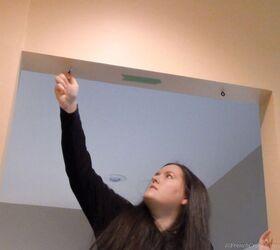 Hang eye hooks in your kitchen ceiling for a simple, $15 idea that's bursting with charm