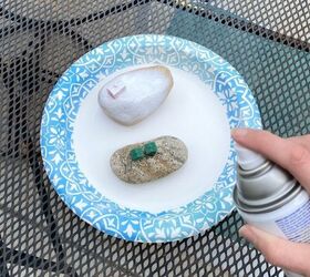 We just found the cutest way to use leftover Monopoly pieces in the garden