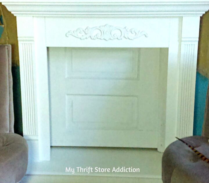 s 14 clever ways to use old doors, This faux fireplace insert