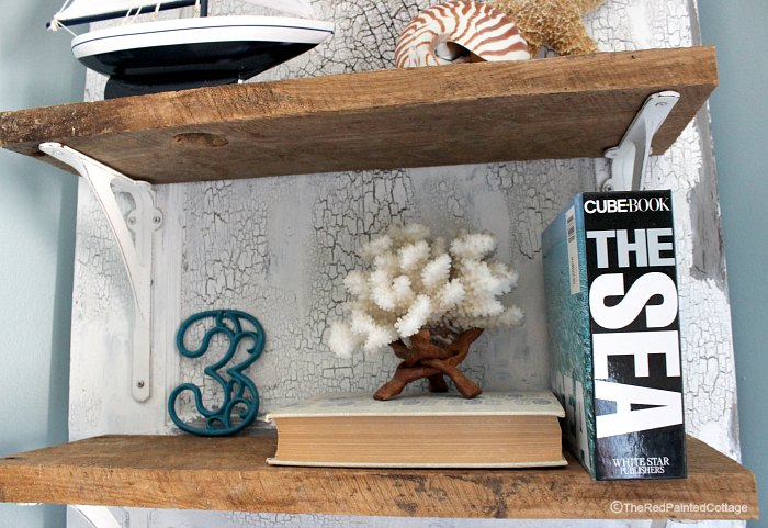 s 14 clever ways to use old doors, These gorgeous coastal shelves