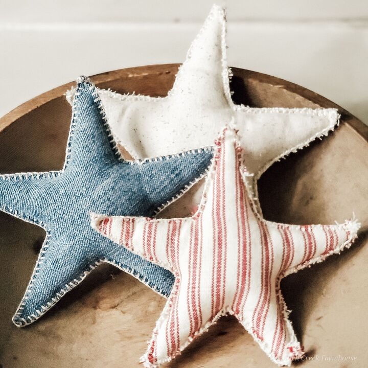 s 20 ways to use old jeans for decor, These patriotic farmhouse fabric stars