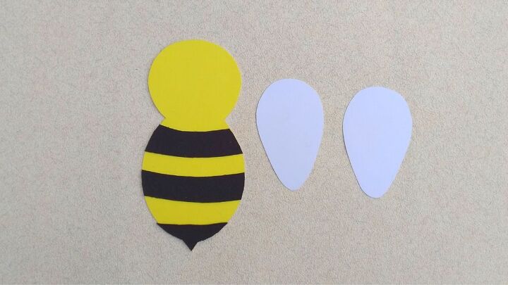 abelha voadora com asas em movimento artesanato de papel