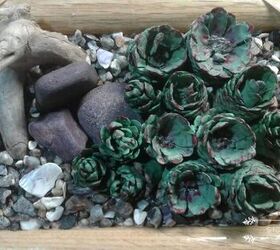 how to make a faux succulent garden with pine cones, Beach Pebbles Added