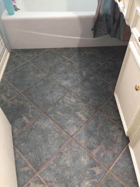 s 9 budget flooring updates that only look high end, Makeover Your Old Tile With PAINT STENCIL
