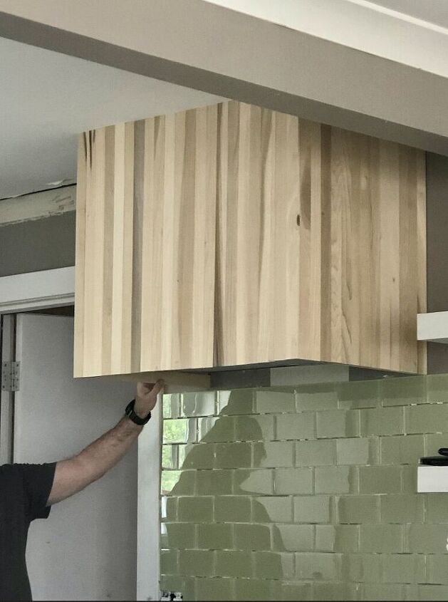 diy wood vent hood with a modern vibe, Installing the boards to plywood