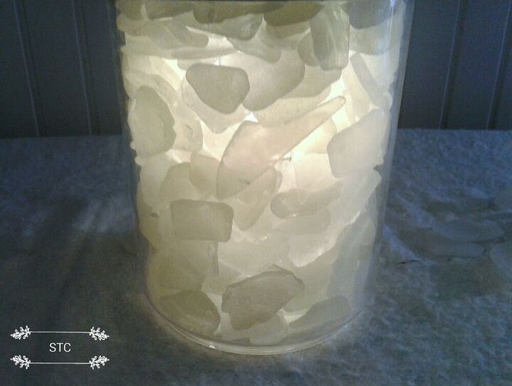 iluminacin de verano vidrio de mar en un cubo de hielo, De cerca