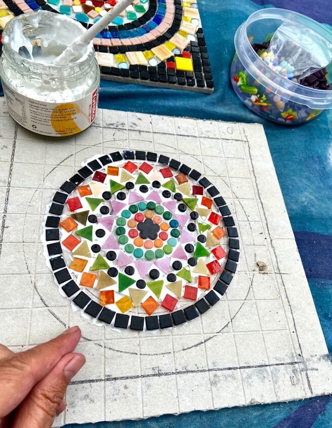 how to transform your outdoor patio with mindful mandala art piece, Adding tiles
