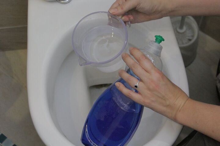 s 15 unexpected ways to use dish soap in your home, Unclog your toilet