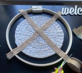 Use a placemat and an embroidery hoop for this sweet and simple door accent