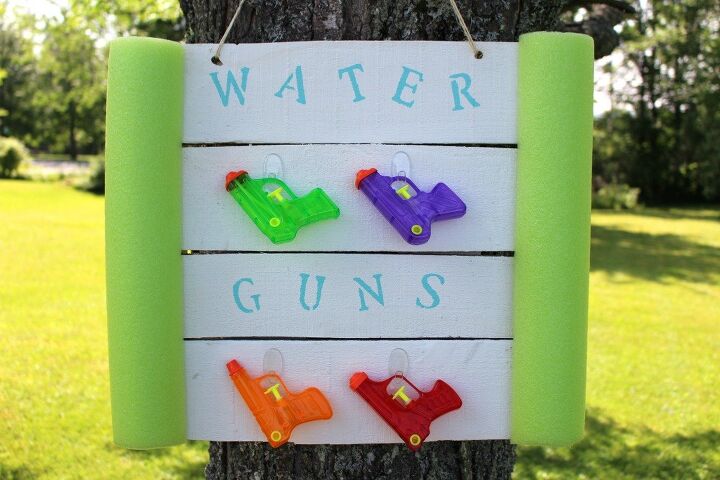 s 25 backyard ideas that ll make your kids summer, This water gun organizer