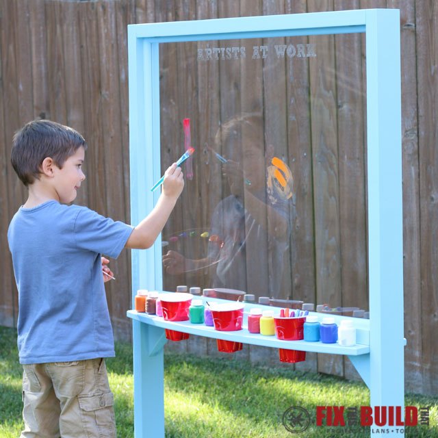 s 25 backyard ideas that ll make your kids summer, An outdoor acrylic easel