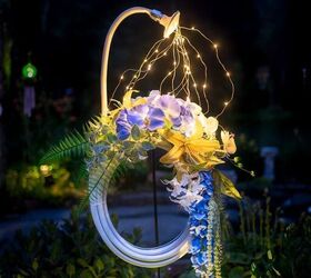 s 17 seriously cute summer wreaths we re excited to try, A stunning lit up hose decoration