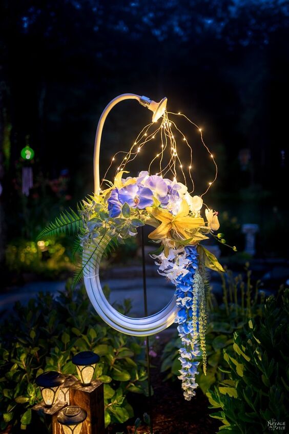s 17 seriously cute summer wreaths we re excited to try, A stunning lit up hose decoration