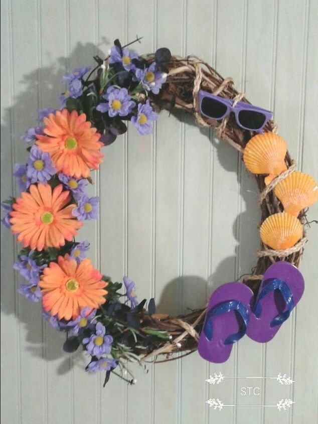 s 17 seriously cute summer wreaths we re excited to try, This one with beachy accents