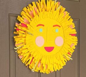 s 17 seriously cute summer wreaths we re excited to try, Her bright sunny decoration