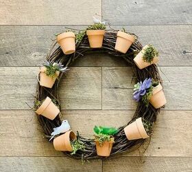 s 17 seriously cute summer wreaths we re excited to try, Her cute woodsy flowerpot display