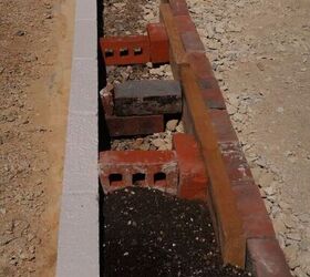 Put a line of bricks in your yard for this simple and lovely way to improve your garden