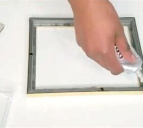 Use a few dollar store picture frames to make high-end bedroom storage