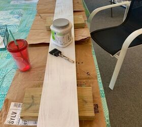 Using a plank and a plastic washer, they make the cutest kid's room accent we've seen in weeks