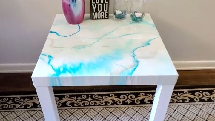 s 10 little known ways to use rubbing alcohol in your home, Add a faux marble look to your table