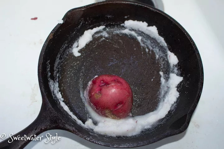 how to clean a burnt pot to perfection, potato and salt in a cast iron pan