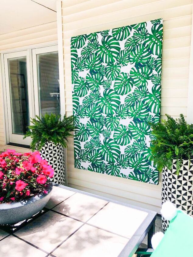 s 14 things you can diy for cheap instead of buying overpriced wall art, Wrap a canvas with a colorful tablecloth