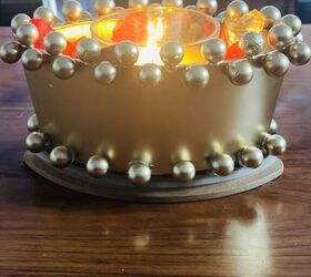 upcyled a old candle jar using marbles