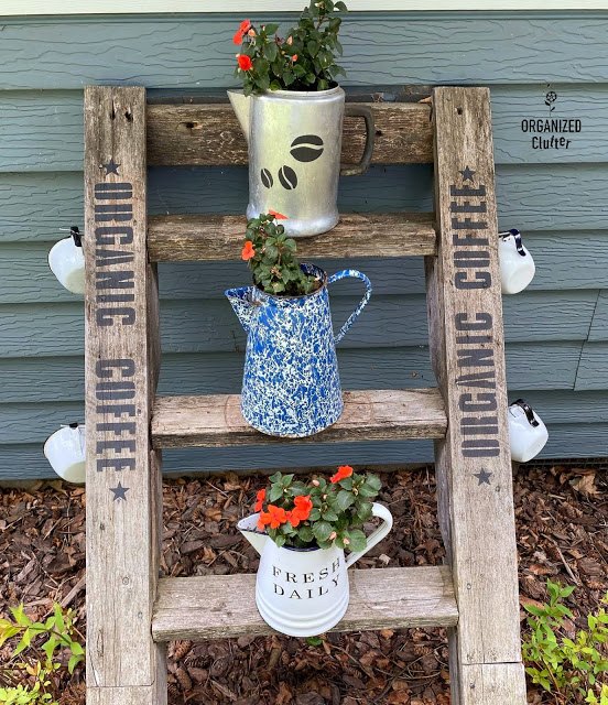coffee themed garden vignette on an old treehouse ladder