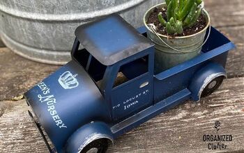 A Dollar General Blue Truck With Decor Transfers And A Succulent