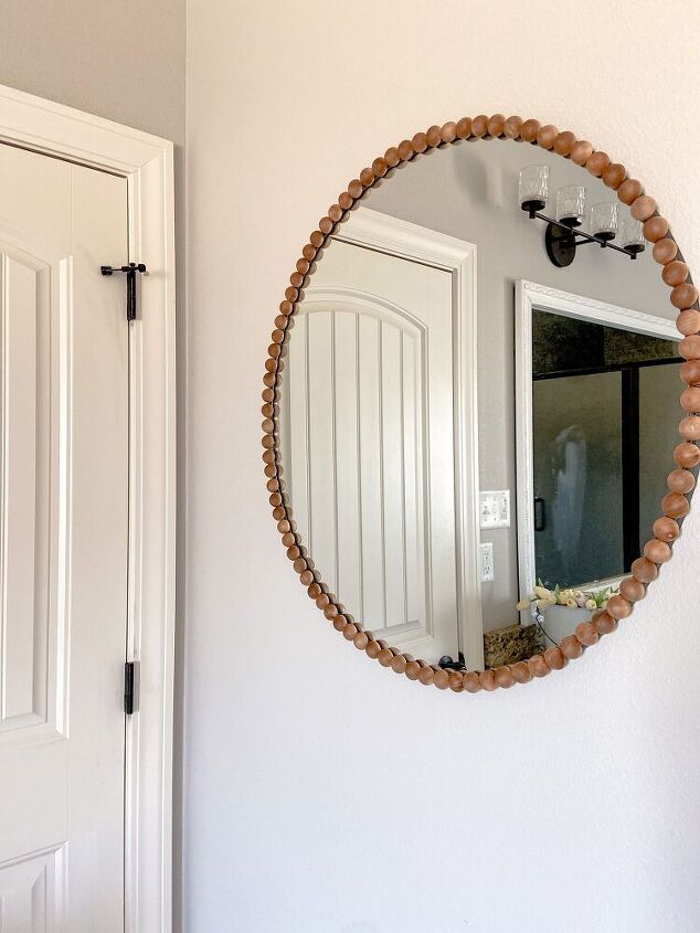 s 13 crazy cool ways people are upgrading their boring mirrors, Stick wooden beads around it