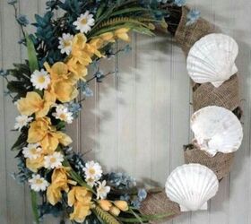 s 15 awesome summer wreaths that will make your front door look so cute, This lovely seashell door decor