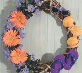 s 15 awesome summer wreaths that will make your front door look so cute, A fun beachy decoration