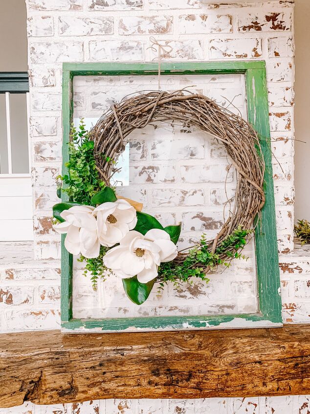 s 15 awesome summer wreaths that will make your front door look so cute, This asymmetrical grapevine wreath