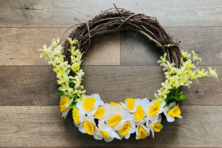 s 15 awesome summer wreaths that will make your front door look so cute, This bright and beautiful faux flower one
