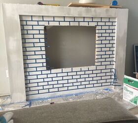 Use some tape for this brilliant way to get the fireplace look everyone's craving—for just $20